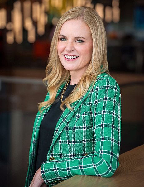 Portrait of a St. Louis Woman Lawyer in a Green Plaid Suit Coat. 